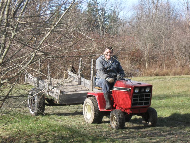 Frank Raso driving a tractor.